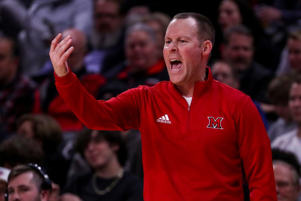 Dec 14, 2022; Cincinnati, Ohio, USA; Miami Redhawks head coach Travis Steele yells to his team during the second half against the Cincinnati Bearcats at Fifth Third Arena.