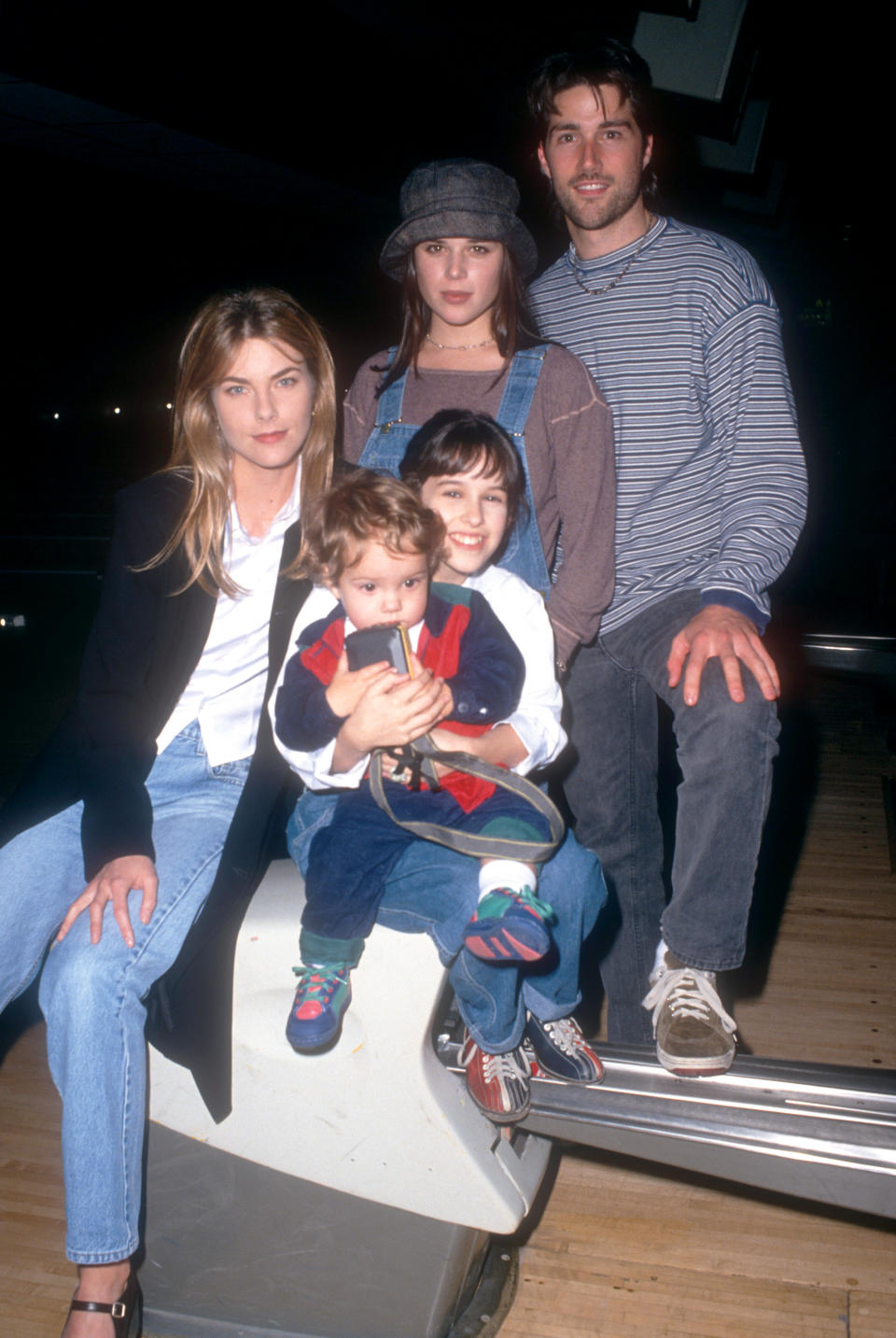 LOS ANGELES, CA - 1996: (L-R) Actress Paula Devicq, actress Neve Campbell, actor Matthew Fox and actress Lacey Chabert, the cast of 
