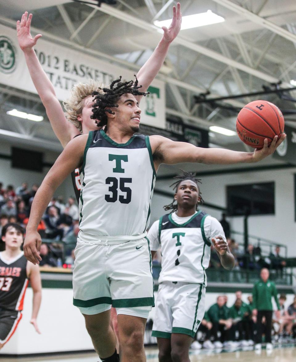 Trinity's CJ Walls looks to score against DeSales in the first half. Walls finished with 18 points in the Rocks 54-49 win over DeSales at Trinity High School in St. Matthews Tuesday night. Nov. 29, 2022