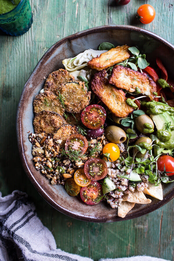 grain bowl with zucchini, seeds, and halloumi