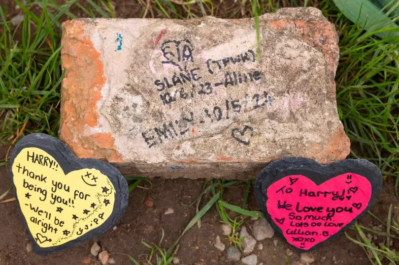 Hearts left with messages for Harry -Credit:Manchester Evening News