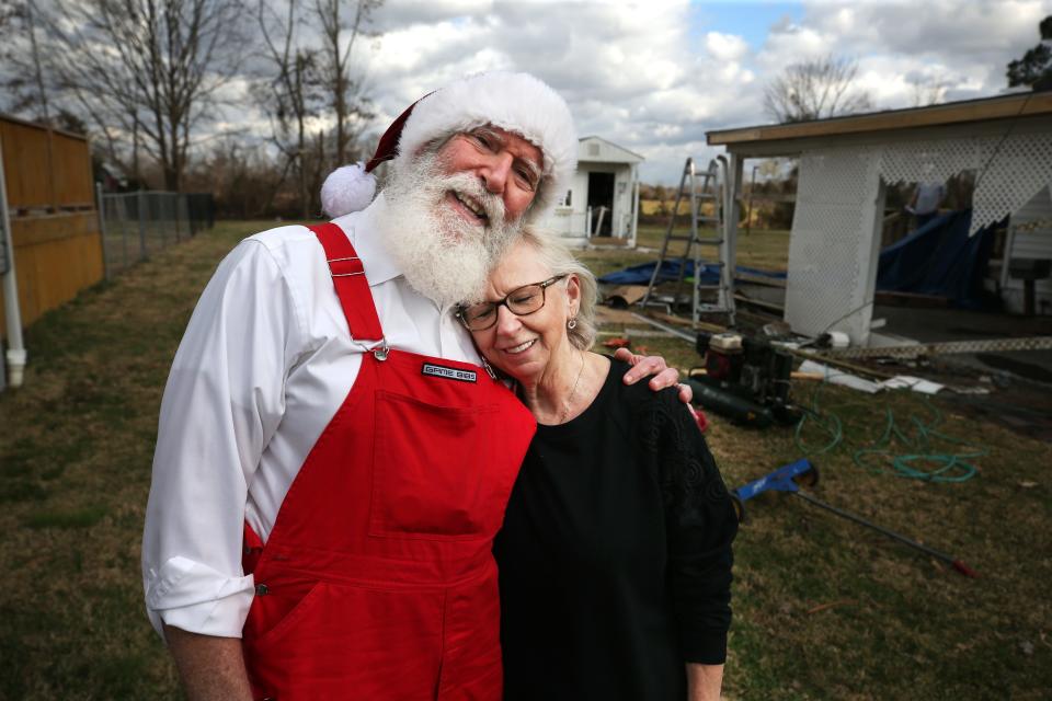Lannie Lear visited with Art Hoffman, a retired public health official, who played Santa Claus in Bremen on Christmas Day. The town is limited to about 200 people but had about 12 fatalities on the night of the tornado.Dec. 25, 2021