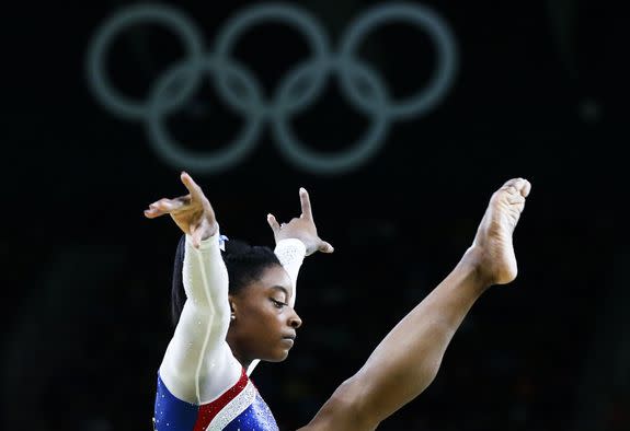 epa05474969 Simone Biles of the USA performs on the Beam in the women's Individual All-Around final of the Rio 2016 Olympic Games Artistic Gymnastics events at the Rio Olympic Arena in Barra da Tijuca, Rio de Janeiro, Brazil, 11 August 2016. EPA/TATYANA ZENKOVICH