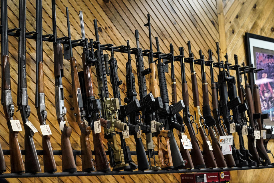Various guns are displayed at a store in Auburn, Maine. (Robert F. Bukaty / AP file)
