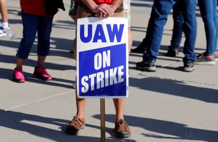 FILE PHOTO: A "UAW On Strike" sign is seen during a rally outside the shuttered GM Lordstown Assembly plant during the United Auto Workers national strike in Lordstown, Ohio