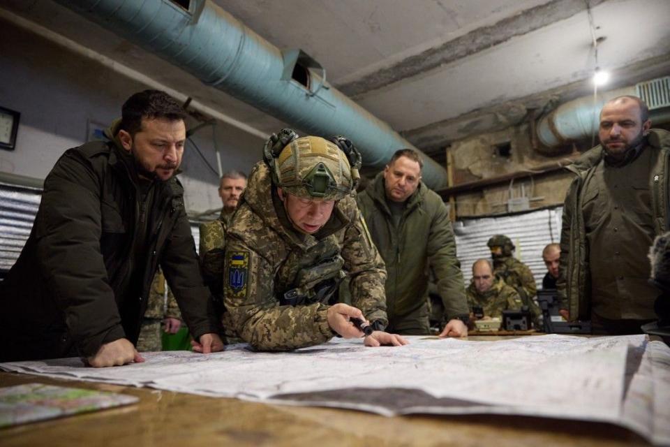 President Volodymyr Zelensky, Defense Minister Rustem Umerov, and Ground Forces Commander Oleksandr Syrskyi during a meeting at a military command post in Kupiansk, Kharkiv Oblast, on Nov. 30, 2023. (President's Office)