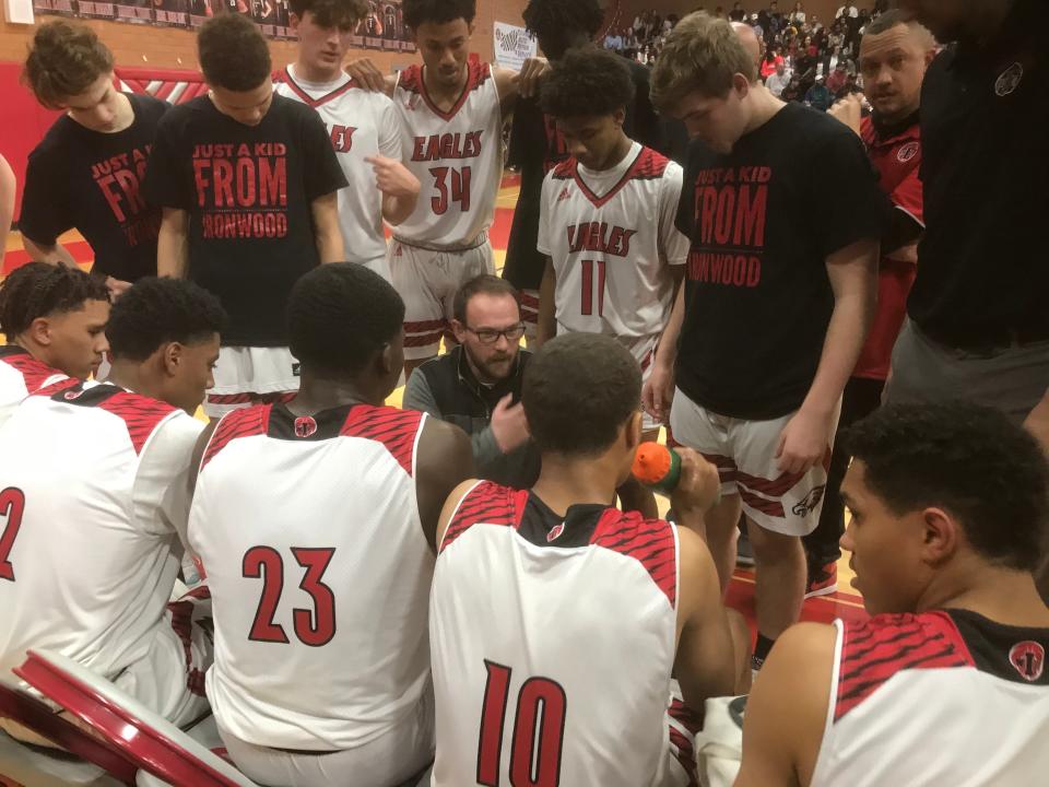 Ironwood basketball coach Jordan Augustine talks to his team during a game on Jan. 14, 2020.