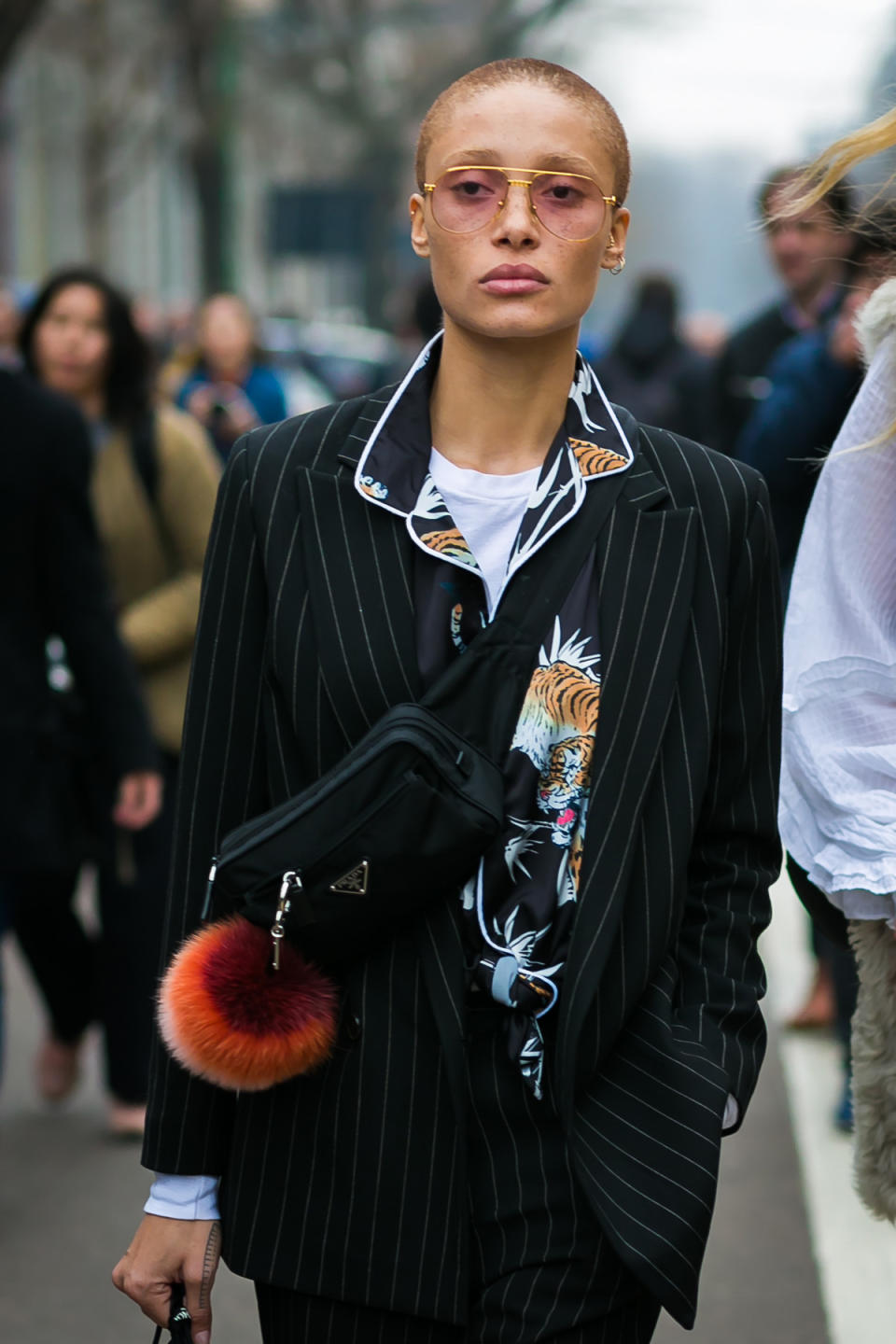 Model Adwoa Aboah is killing us with her pajama suiting and ’90s-style Prada crossbody.