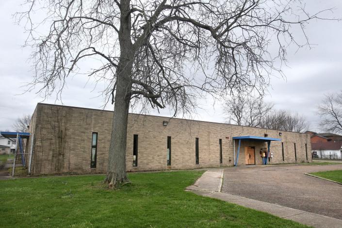 The exterior of 1318 Gonder Avenue SE in Canton. There are plans to turn the building into a grocery store and health center.