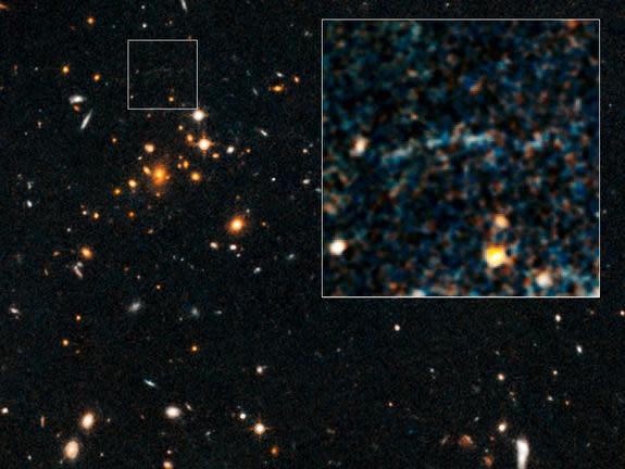 These images, taken by NASA's Hubble Space Telescope, show an arc of blue light behind an extremely massive cluster of galaxies, called IDCS J1426.5+3508, which is located 10 billion light-years away.