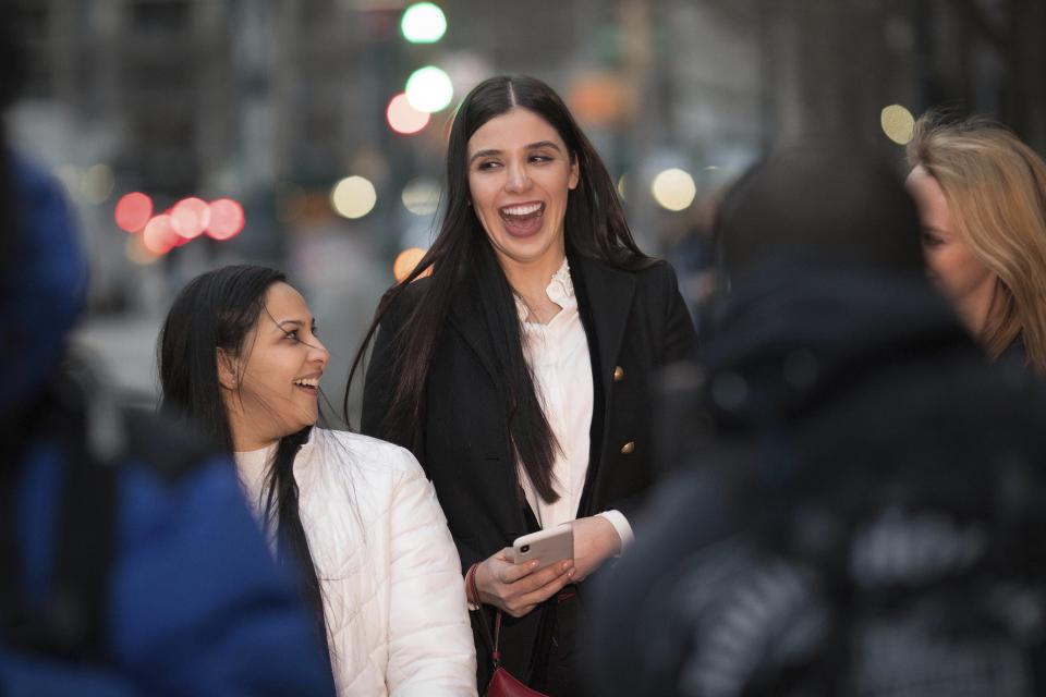 FILE - Emma Coronel, center, and lawyer Mariel Colón leave a federal court, in New York, Jan. 17, 2019, after attending the trial of Coronel's husband Joaquin "El Chapo" Guzman. (AP Photo/Kevin Hagen, File)