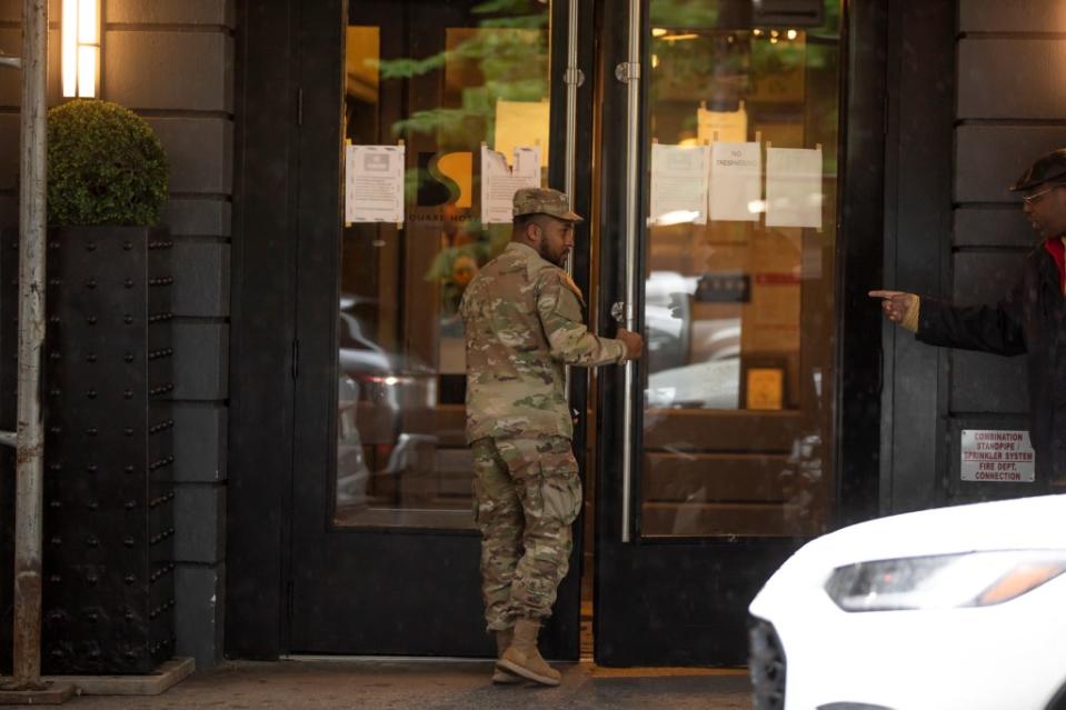 A National Guard soldier is seen stationed at the entrance of the lobby. LP Media