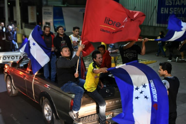 Supporters of defeated opposition presidential candidate Salvador Nasralla protest against the inauguration of President Juan Orlando Hernandez