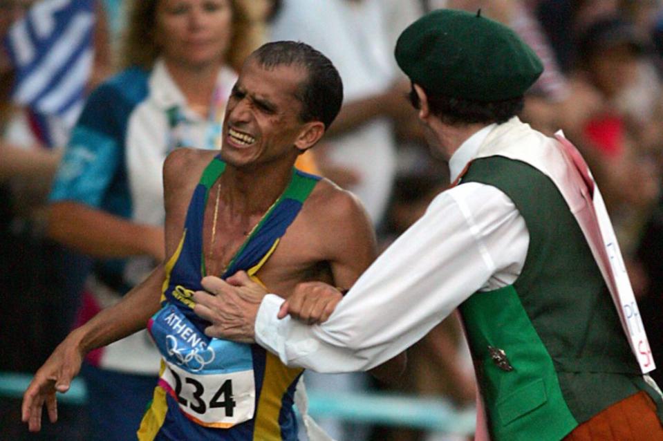 <p>Brazilian runner Vanderlei de Lima was in the lead at the Olympic marathon in 2004 when <a href="https://www.history.com/this-day-in-history/marathoner-assaulted-at-olympics" rel="nofollow noopener" target="_blank" data-ylk="slk:a mentally ill bystander approached him and pushed him into the crowd;elm:context_link;itc:0;sec:content-canvas" class="link ">a mentally ill bystander approached him and pushed him into the crowd</a>. De Lima resumed running, but was overtaken two miles before the finish line to ultimately finish in third. Based on how he handled the incident, de Lima was later awarded the Pierre de Coubertin medal for sportsmanship.</p>