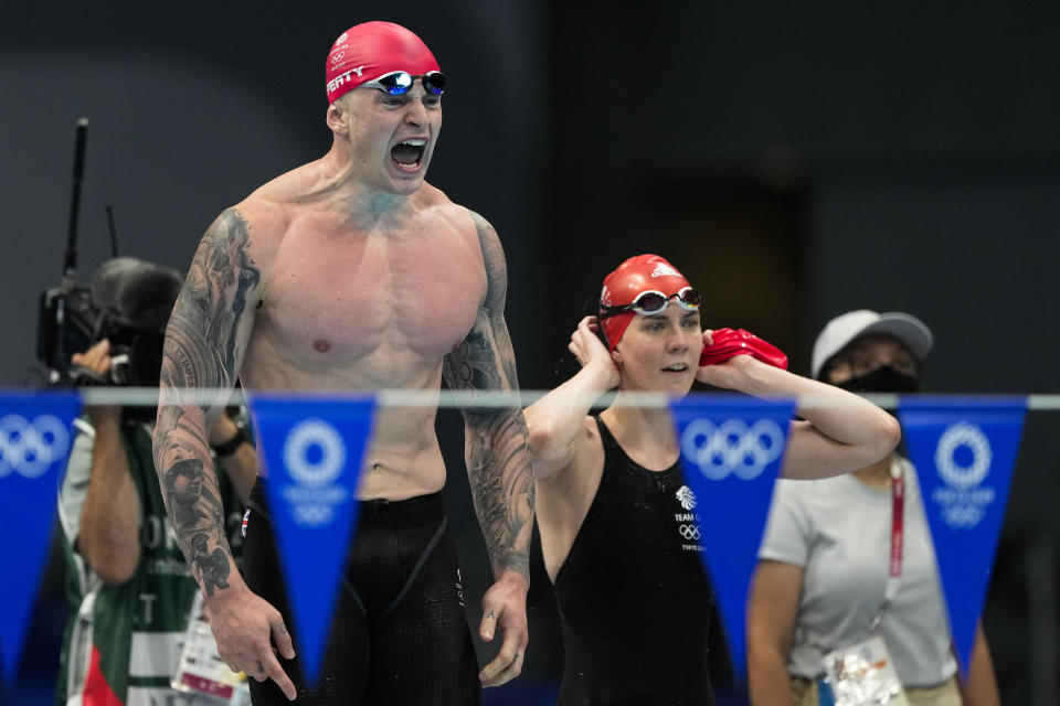 Adam Peaty celebrates winning the gold medal in the mixed 4x100-meter medley relay final at the 2020 Summer Olympics, Saturday, July 31, 2021, in Tokyo, Japan. (AP Photo/Jae C. Hong)