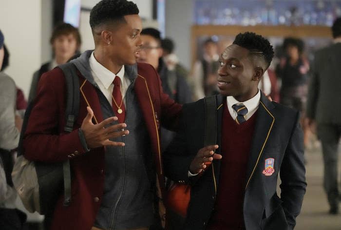Will and Carlton walking in the school hallway in their school uniforms