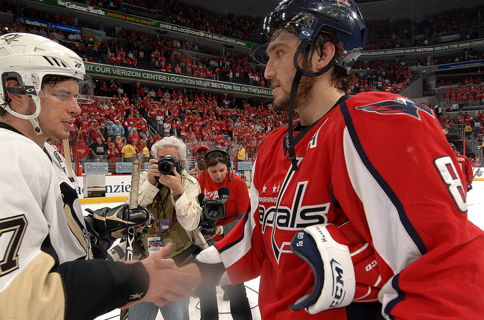 <p>Alex Ovechkin #8 of the Washington Capitals and Sidney Crosby #87 of the Pittsburgh Penguins shake hands at the end of the game at the Verizon Center during Game Seven of the Eastern Conference Semifinals of the 2009 NHL Stanley Cup Playoffs on May 13, 2009 in Washington, DC. The Penguins won the game 6-2. (Photo by Mitchell Layton/NHLI via Getty Images) </p>