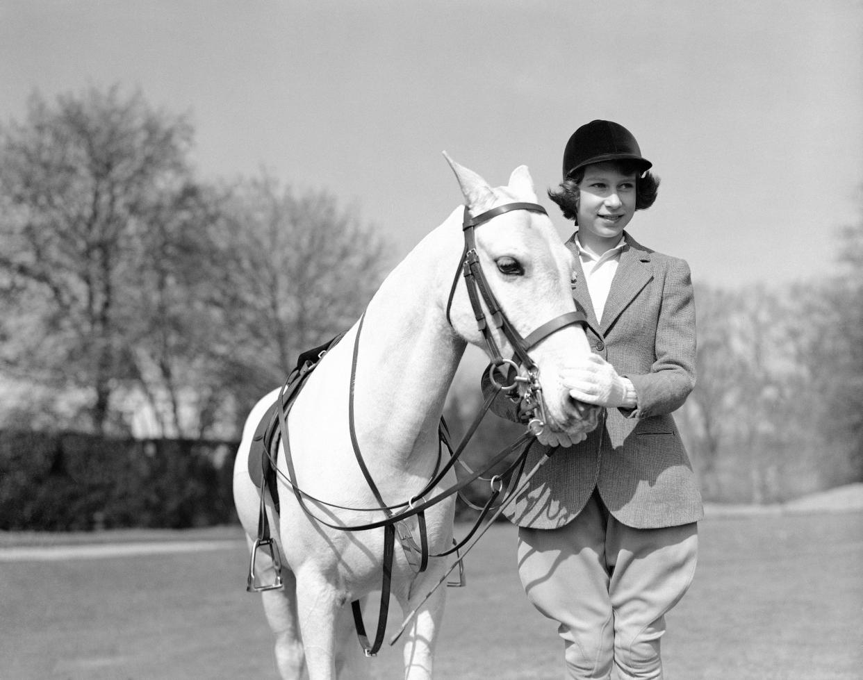 Princess Elizabeth the eldest daughter of King George VI and Queen Elizabeth, poses for a photo on her 13th birthday, in Windsor Great Park, in England, April 21, 1939. 