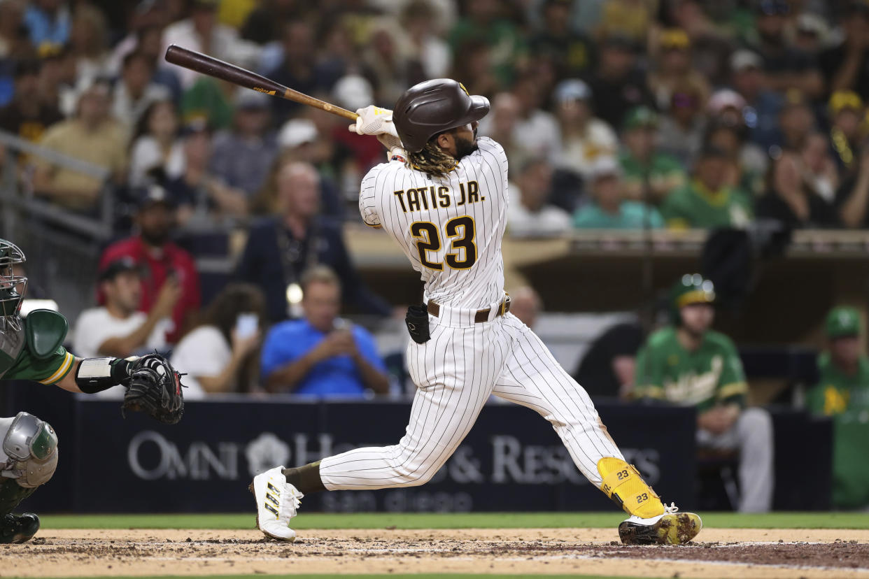 San Diego Padres' Fernando Tatis Jr. watch his home run to left field against the Oakland Athletics in the third inning of a baseball game Tuesday, July 27, 2021, in San Diego. (AP Photo/Derrick Tuskan)