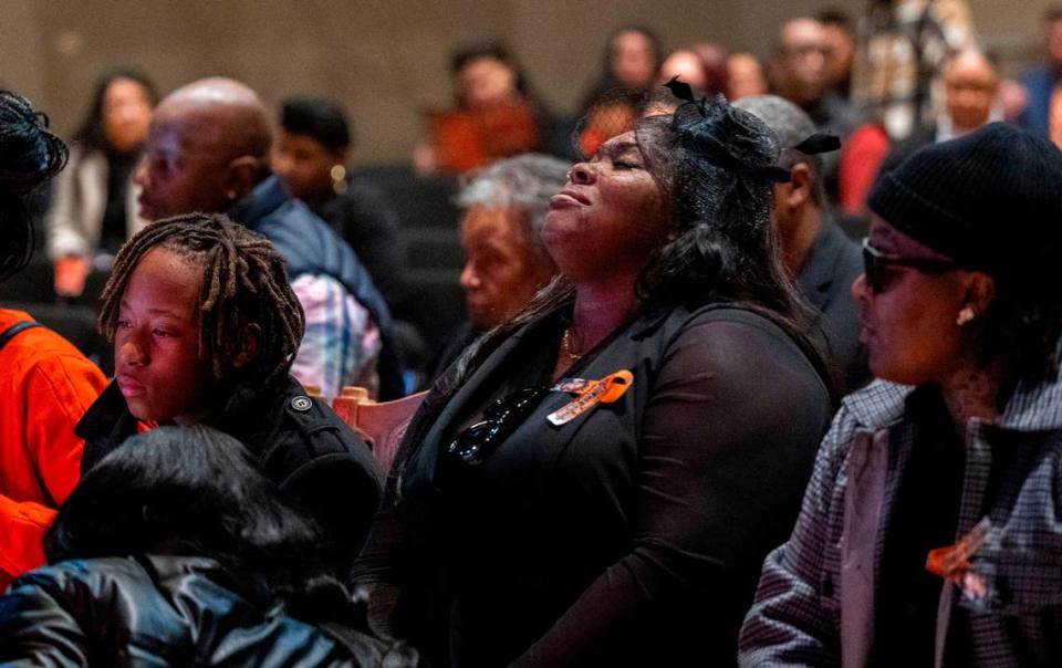 Keith “KJ” Frierson’s mother, Brittani Frierson, center, sits with her family during his funeral service at Liberty Towers Church in Foothill Farms on Saturday. Frierson, 10, was killed by another ten-year-old boy who found a gun in his father’s vehicle and shot his friend. Lezlie Sterling/lsterling@sacbee.com