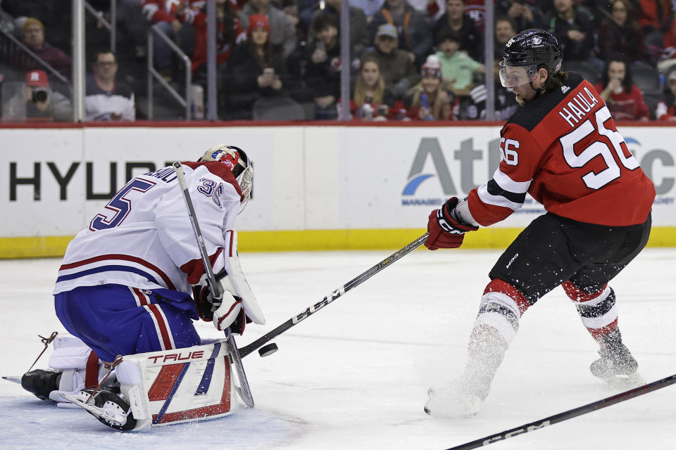 Montreal Canadiens goaltender Sam Montembeault stops a shot by New Jersey Devils left wing Erik Haula (56) during the second period of an NHL hockey game Wednesday, Jan. 17, 2024, in Newark, N.J. (AP Photo/Adam Hunger)