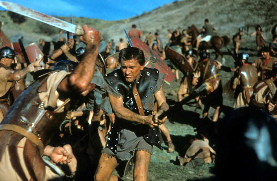 Kirk Douglas the slave Spartacus, engaged in battle in a scene from the film 'Spartacus', 1960. (Photo by Universal Pictures/Getty Images)