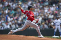 Los Angeles Angels starting pitcher Kenny Rosenberg works against the Seattle Mariners during the first inning of a baseball game, Sunday, June 19, 2022, in Seattle. (AP Photo/John Froschauer)