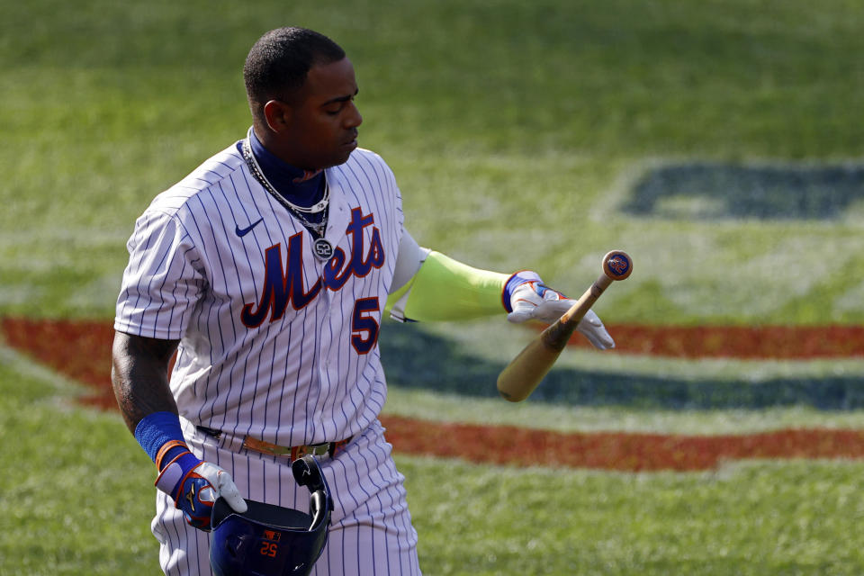 New York Mets' Yoenis Cespedes reacts after striking out against the Atlanta Braves during the sixth inning of a baseball game Saturday, July 25, 2020, in New York. (AP Photo/Adam Hunger)