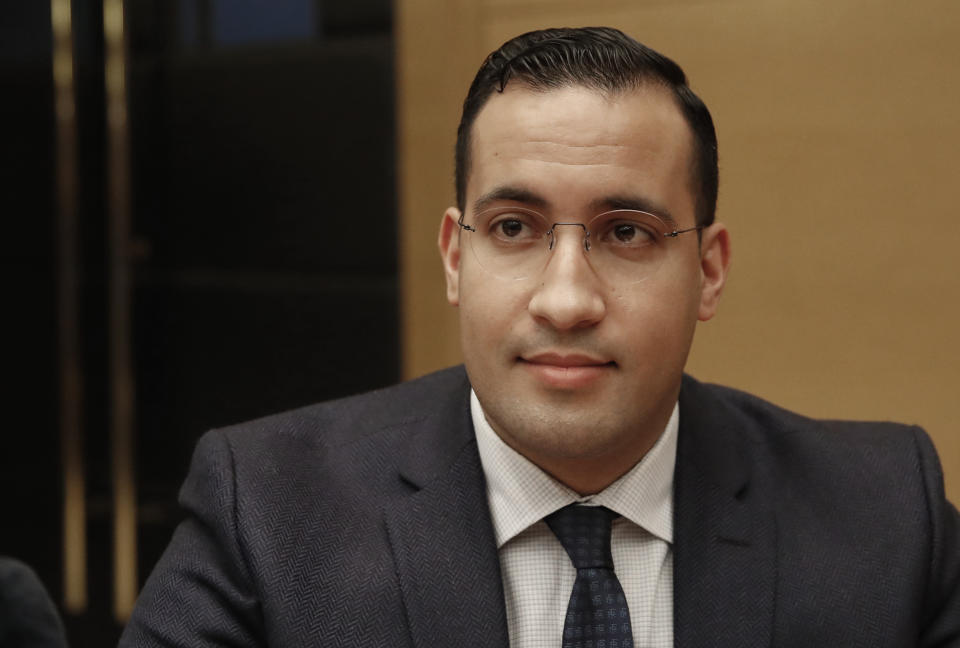 Former President Macron's security aide Alexandre Benalla appears before the French Senate Laws Commission prior to his hearing, in Paris, Monday, Jan. 21, 2019. Benalla has been taken into police custody last week in an investigation of possible misuse of diplomatic passports and then released. (AP Photo/Christophe Ena)