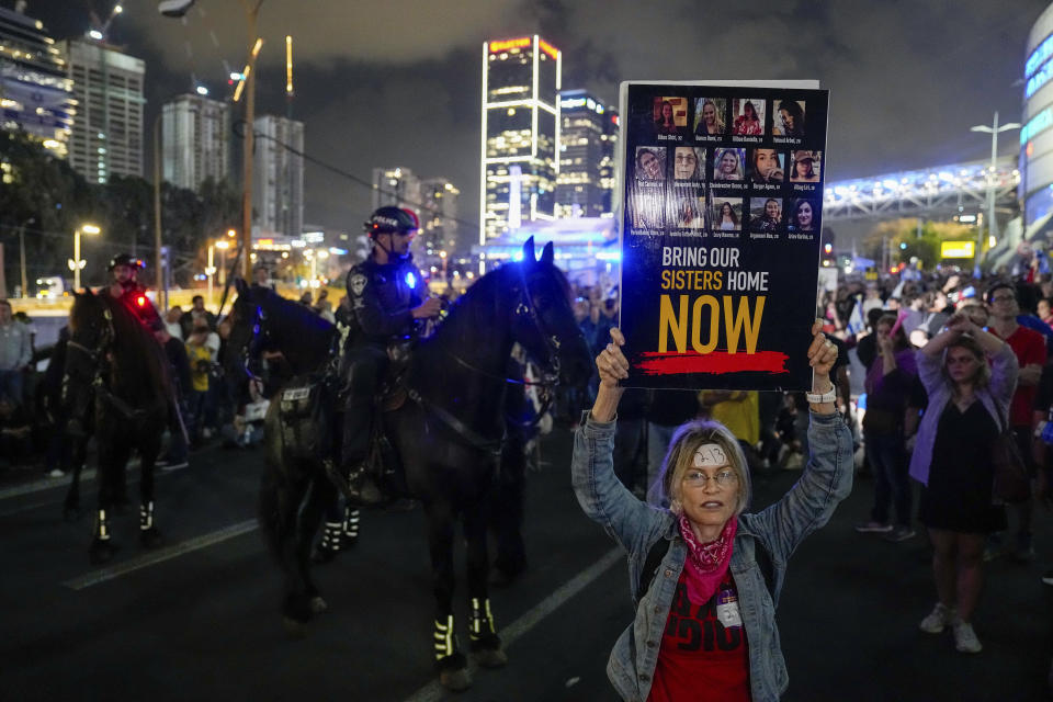 Israeli protesters block a highway during a demonstration calling on the government to reach a cease-fire deal with Hamas to bring home hostages in Tel Aviv, Israel, May 6, 2024. The protesters took to the streets after the government appeared to spurn a deal accepted by Hamas. Israel said it would continue negotiations. (AP Photo/Ariel Schalit)