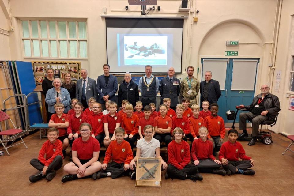 Staff, pupils and guests at the Applegarth School event, including right, Jim Sedgwick, and left, in blue cargidan, Joan Haslam