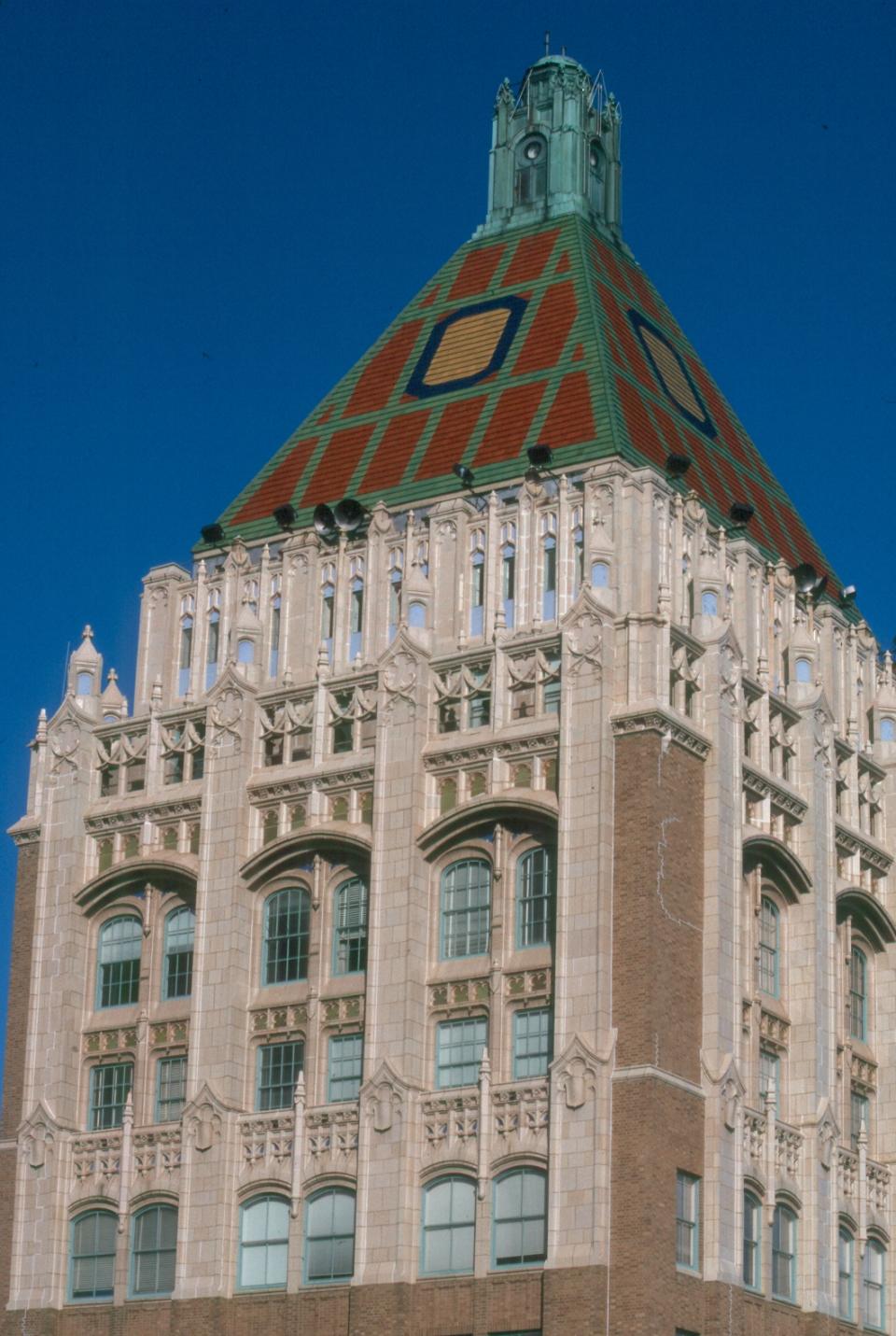 This undated photo provided by the Tulsa Regional Chamber shows the Philtower Building in Tulsa, Okla. It's one of a number of notable Art Deco treasures in Tulsa mostly built in the 1920s during an oil boom. The Philtower was commissioned by oilman Waite Phillips and is known for its colorful tiled roof. (AP Photo/Tulsa Regional Chamber, Don Sibley)