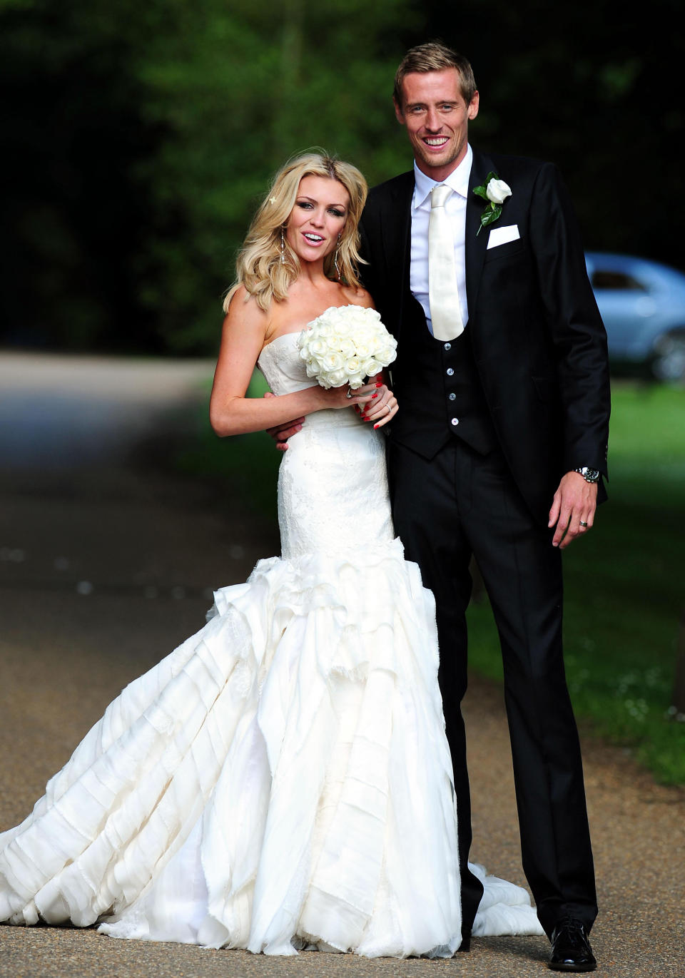 Footballer Peter Crouch and model Abbey Clancy in the grounds of Stapleford Park in Leicester following their wedding