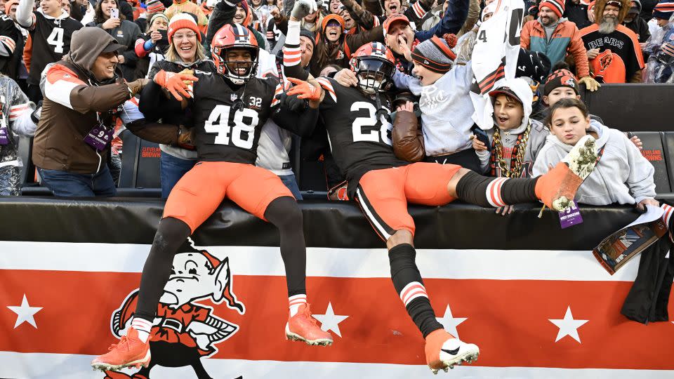 Tanner McCalister and Mike Ford of the Cleveland Browns celebrate after a fourth quarter interception to beat the Bears. - Nick Cammett/Getty Images