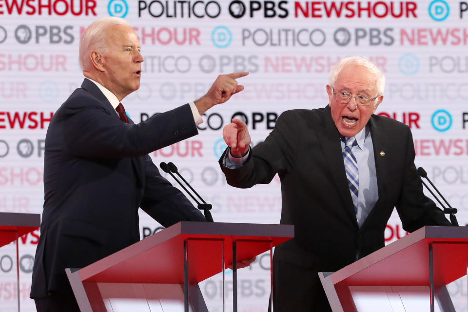 At Thursday's Democratic debate, Vice President Joe Biden and Sen. Bernie Sanders (I-Vt.) went another round of arguments over "Medicare for All." (Photo: Justin Sullivan via Getty Images)