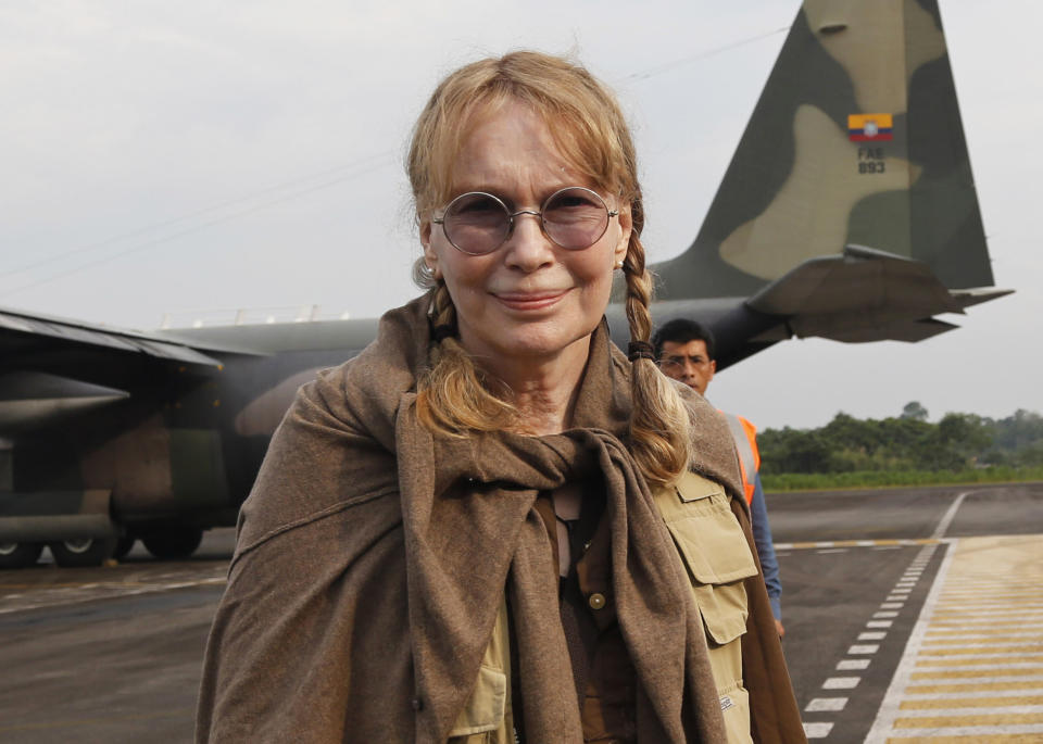 FILE - This Jan. 28, 2014 file photo shows U.S. actress Mia Farrow at Lago Agrio airport, before she flies to the Aguarico field in the Ecuadorean Amazonia region, Aguarico, Ecuador. Dylan Farrow, the adopted daughter of Woody Allen and Mia Farrow, penned an emotional open letter, accusing Hollywood of callously lionizing Allen, who she claims abused her. The letter revived in stunning detail an allegation more than two decades old. (AP Photo/Dolores Ochoa, File)