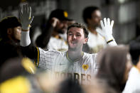 San Diego Padres' Jackson Merrill celebrates after hitting a solo home run during the third inning of a baseball game against the St. Louis Cardinals, Monday, April 1, 2024, in San Diego. (AP Photo/Denis Poroy)
