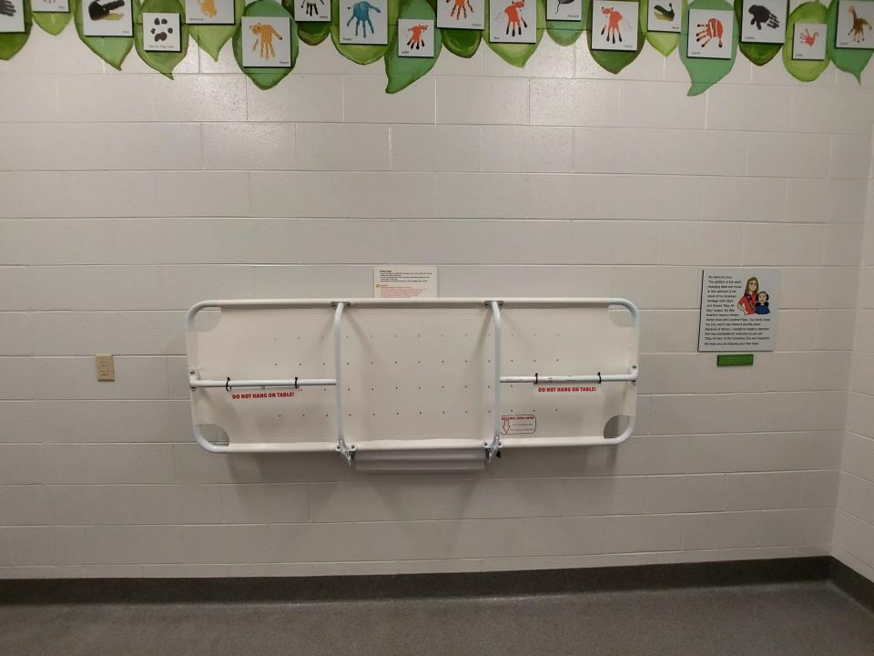 The universal changing table at the Columbus Zoo and Aquarium, installed in the fall of 2020, is in a family restroom at Adventure Cove.