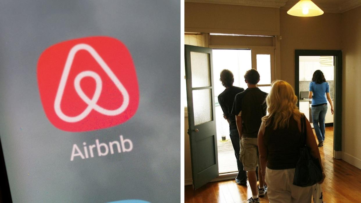 Airbnb app and people looking at rental property