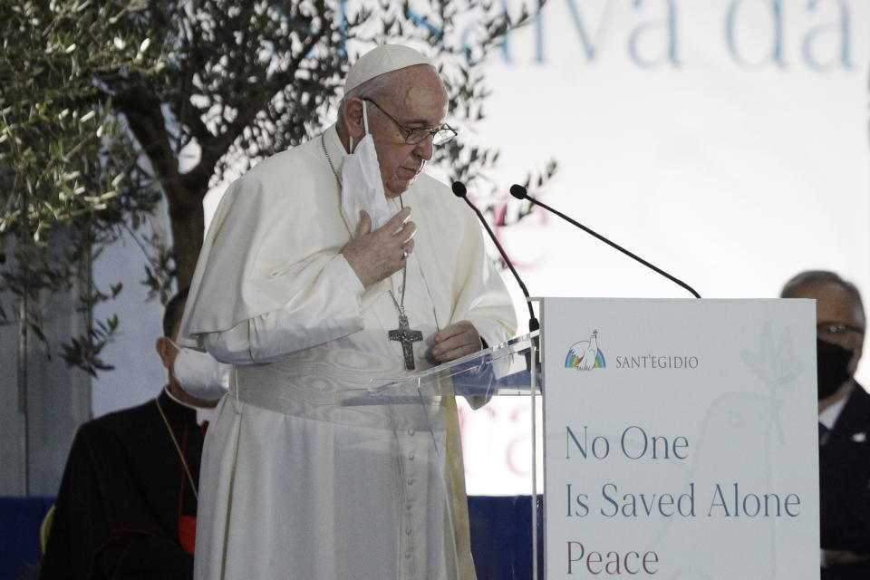 Pope Francis speaks during an inter-religious ceremony for peace in the square outside Rome's City Hall, Tuesday, Oct. 20, 2020 (AP Photo/Gregorio Borgia)