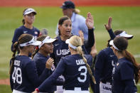 United States' Cat Osterman, center, reacts with teammates after the sixth inning of a softball game against Mexico at the 2020 Summer Olympics, Saturday, July 24, 2021, in Yokohama, Japan. (AP Photo/Matt Slocum)