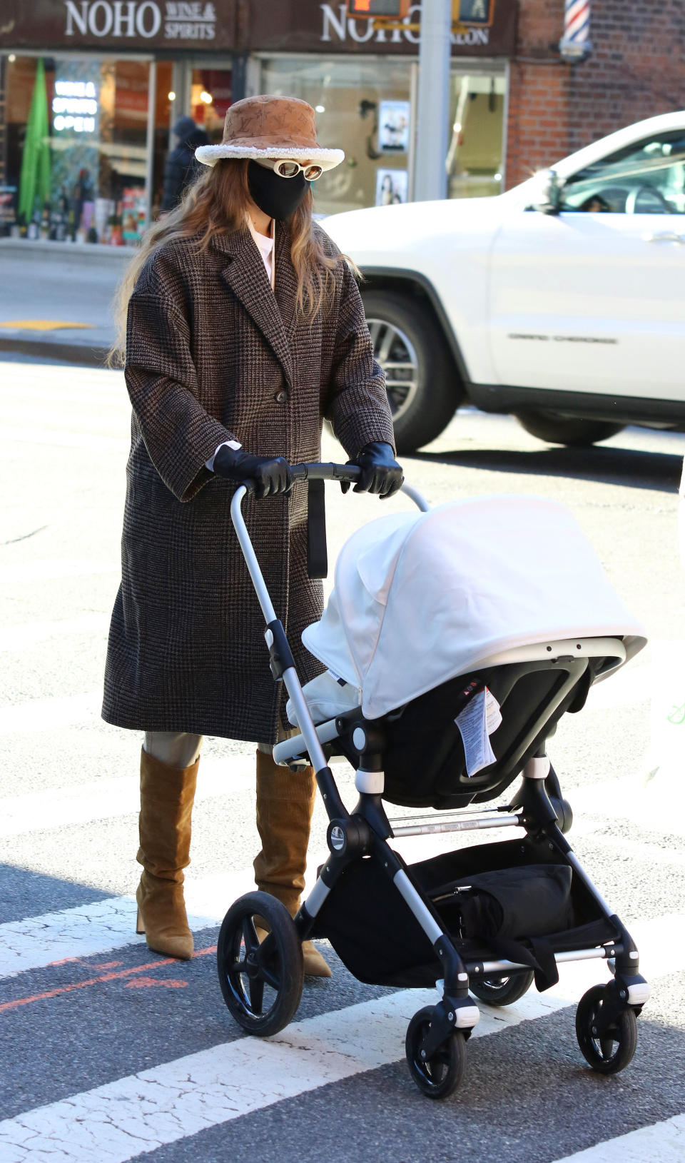 Gigi Hadid opted for an Oversize wool coat from Mango when she enjoyed a walk in New York with her daughter earlier this month.  (Getty Images)