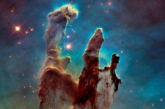 Les Piliers de la création, dévoilés par Hubble en 1995 au cœur de la nébuleuse de l’Aigle, dans la Voie lactée.  - Credit:ESA/Nasa