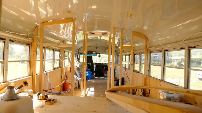 All aboard: Manitoba couple converting used school bus into eco-friendly, affordable home