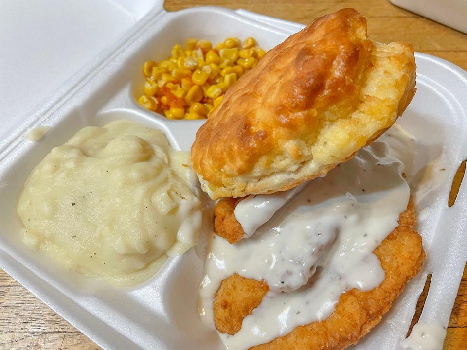 Fiesta corn, mashed potatoes, biscuit and chicken tenders with sawmill gravy from Carole's Country Cupboard restaurant in Nicholson, Ga. on Tuesday, Aug. 15, 2023.