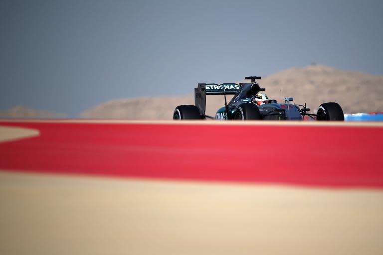 Mercedes' British driver Lewis Hamilton drives during the third practice session ahead of the Formula One Bahrain Grand Prix at the Sakhir circuit in the desert south of the Bahraini capital, Manama, on April 18, 2015