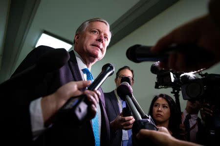 FILE PHOTO: Rep. Mark Meadows (R-NC) speaks to reporters as he arrives as former Trump campaign aide George Papadopoulos gives a voluntary, transcribed interview behind closed doors before the House Oversight and Judiciary Committee, on Capitol Hill, in Washington, U.S., October 25, 2018. REUTERS/Al Drago