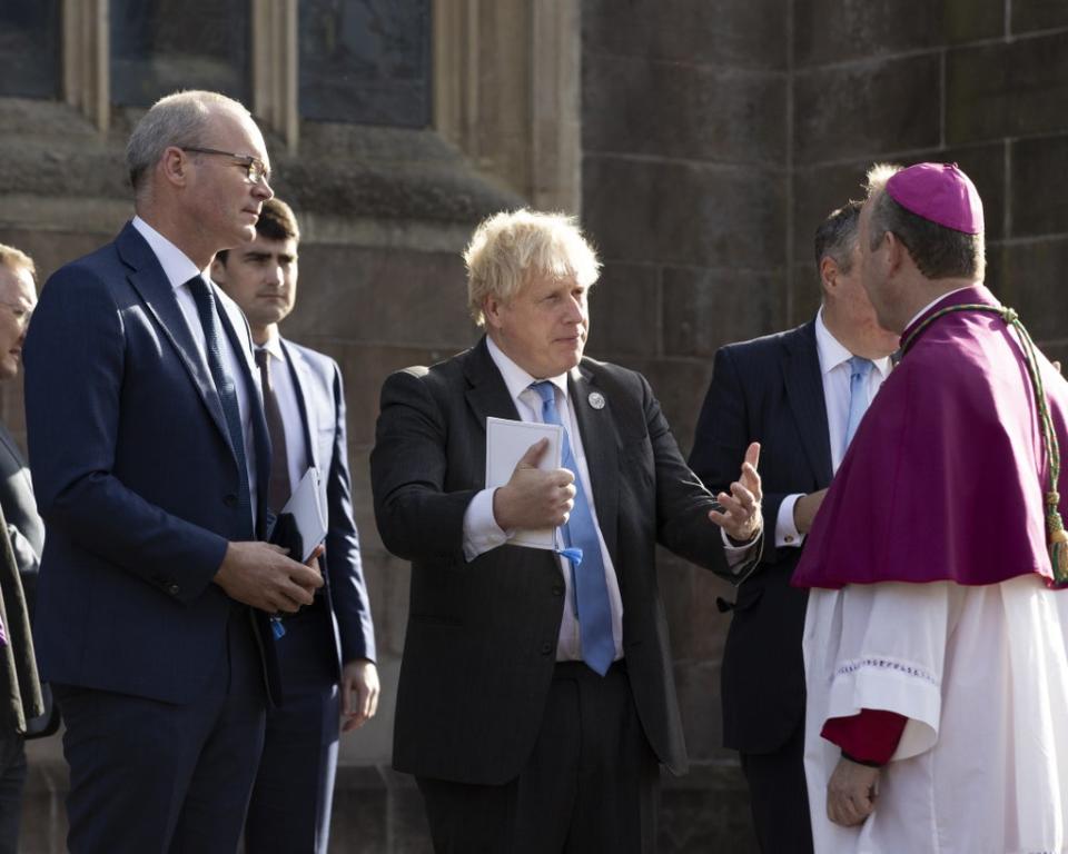 Simon Coveney and Boris Johnson during a service to mark the centenary of Northern Ireland at St Patrick’s Cathedral in Armagh (Liam McBurney/PA) (PA Wire)