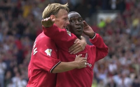 Andy Cole scores Man U 2nd goal against Newcastle in 2000 and celebrates with Teddy Sheringham - Credit: RUSSELL CHEYNE FOR THE TELEGRAPH