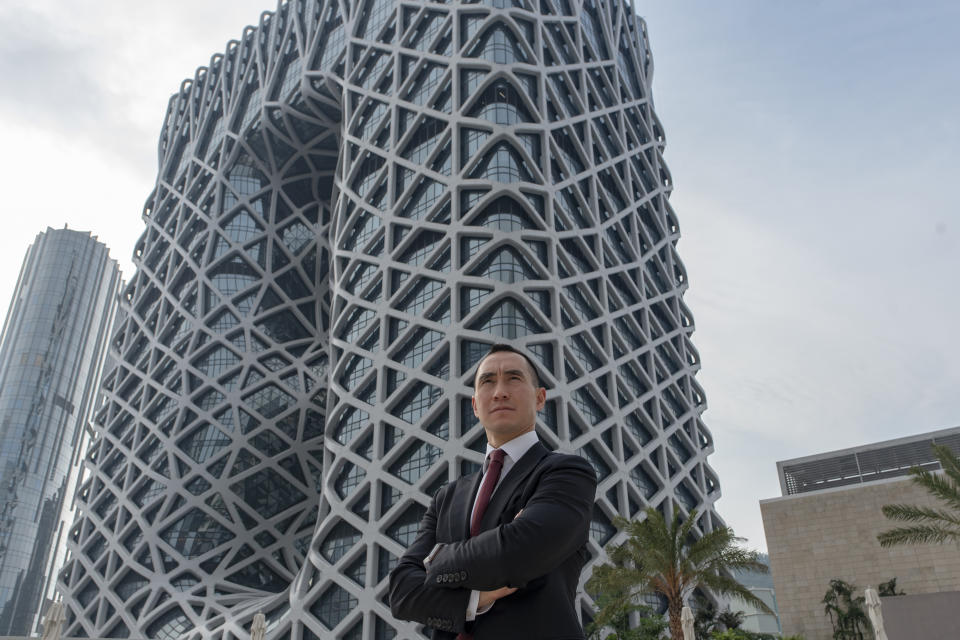 Melco Resorts and Entertainment chairman Lawrence Ho poses for a picture in front of Melco's new hotel "Morpheus" after an interview with AFP in Macau on June 15, 2018. - The flamboyant new casino designed by Zaha Hadid opened its doors in Macau on June 15, featuring futuristic curves and skeletal steel structures typical of the acclaimed late architect. (Photo by Philip FONG / AFP)        (Photo credit should read PHILIP FONG/AFP via Getty Images)